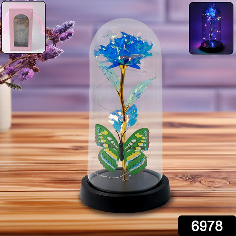 LED-Powered Eternal Rose in plastic Dome with Butterfly and Fairy Lights